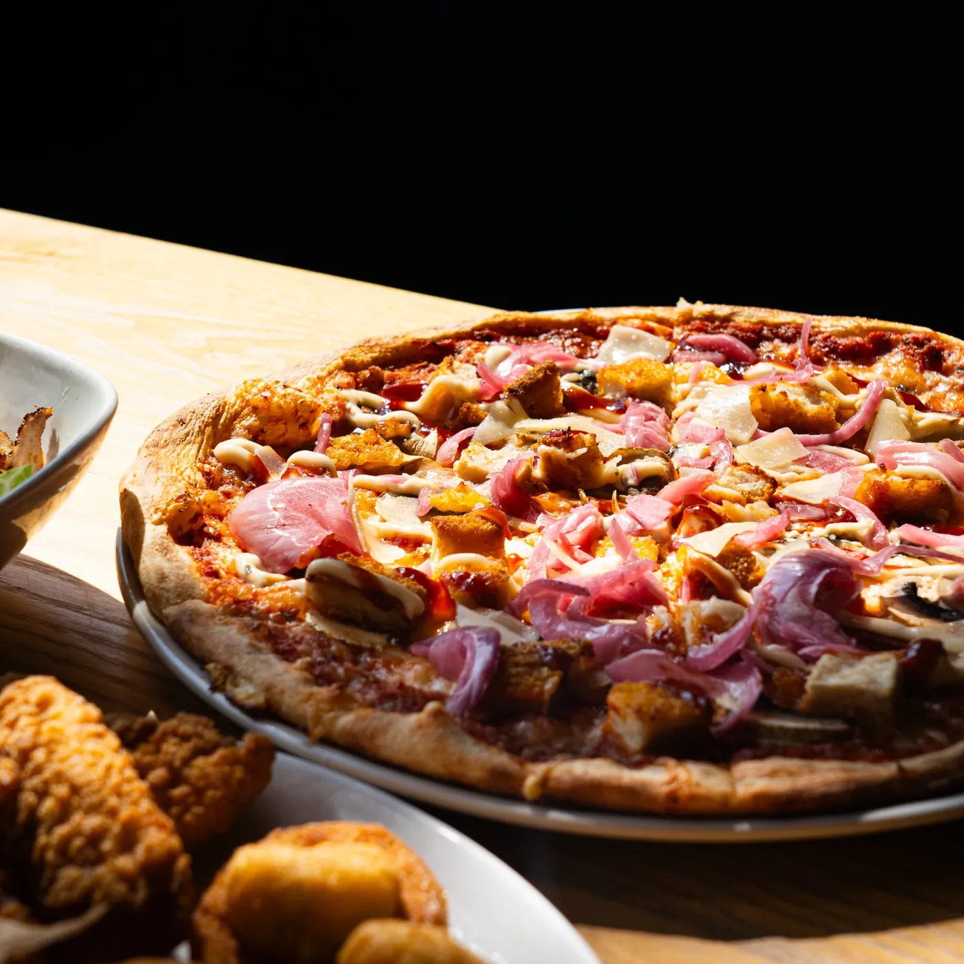 Nybakad pizza från CGs Burgers & Pizzas